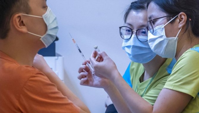 Çin ana karasında yaşayanlar, BioNTech aşısını Hong Kong'da yaptırabilecek