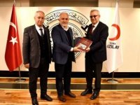 KİSEV heyeti, Türk Kızılay Genel Başkanı Kerem Kınık'ı ziyaret etti