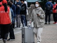 Güney Kore, Çin'den gelenlere uyguladığı vize kısıtlamalarını kaldırıyor
